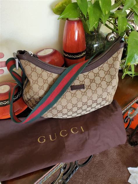 gucci crossbody with thick strap.